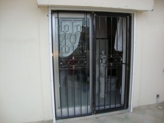 PORTE GRILLE OUVRANTE